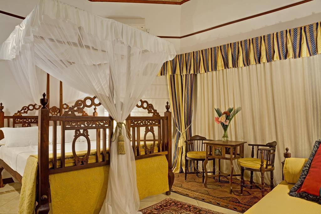 Afrochic Diani Hotel Укунда Стая снимка